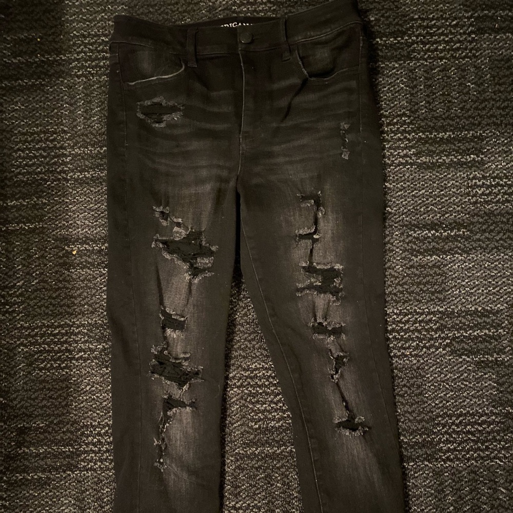 AE size 10 black distressed jeans, lightly worn.